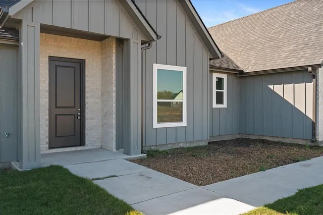 a view of backyard of house