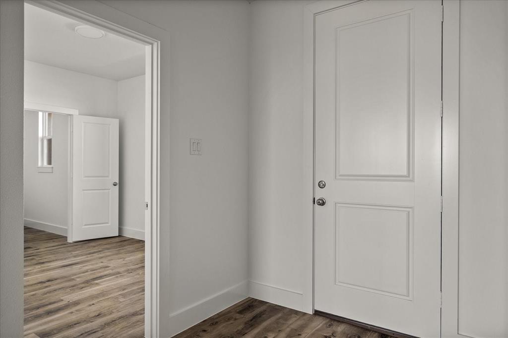 3232 Willow Road Celeste, TX 75423 - Photo 5 of 31 a view of a hallway with wooden floor
