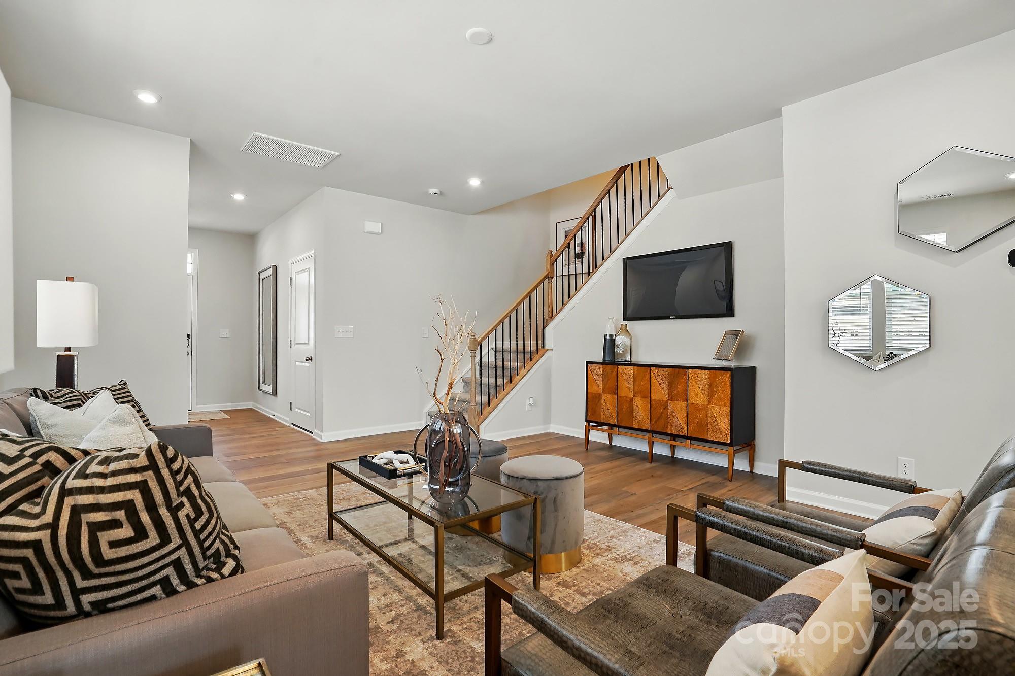331 Laura Elizabeth Lane Clover, SC 29710 - Photo 14 of 31 a living room with furniture and a flat screen tv