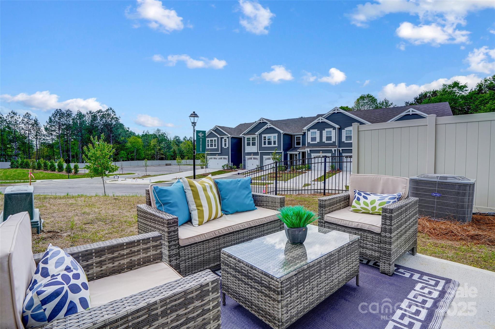 331 Laura Elizabeth Lane Clover, SC 29710 - Photo 28 of 31 a view of a patio with couches and a table and chairs with wooden floor