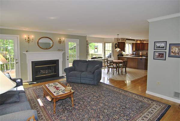 34 Grey Rock Road Bedford, NH 03110 - Photo 11 of 27 a living room with furniture and a fireplace