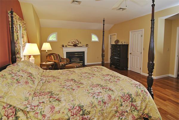 34 Grey Rock Road Bedford, NH 03110 - Photo 13 of 27 a bedroom with a bed and a dresser
