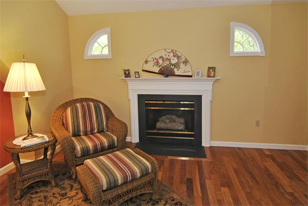 34 Grey Rock Road Bedford, NH 03110 - Photo 14 of 27 a living room with furniture and a fireplace