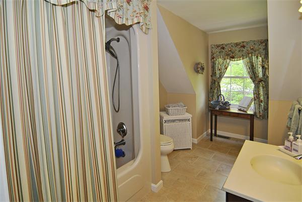 34 Grey Rock Road Bedford, NH 03110 - Photo 21 of 27 a bathroom with a sink toilet and shower