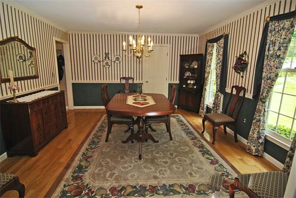 34 Grey Rock Road Bedford, NH 03110 - Photo 6 of 27 a view of a dining room with furniture