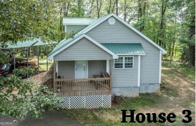 a view of a field with an outdoor space