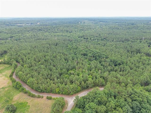 3605 Burnett Mills Road Bolivar, TN 38008 - Photo 2 of 9 an aerial view of residential house with outdoor space