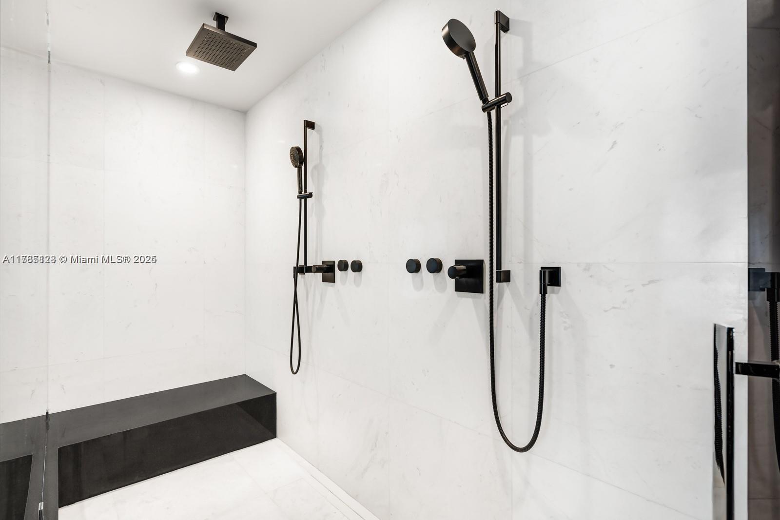 18555 Collins Avenue, Unit 701 Sunny Isles Beach, FL 33160 - Photo 12 of 21 a bathroom with a shower