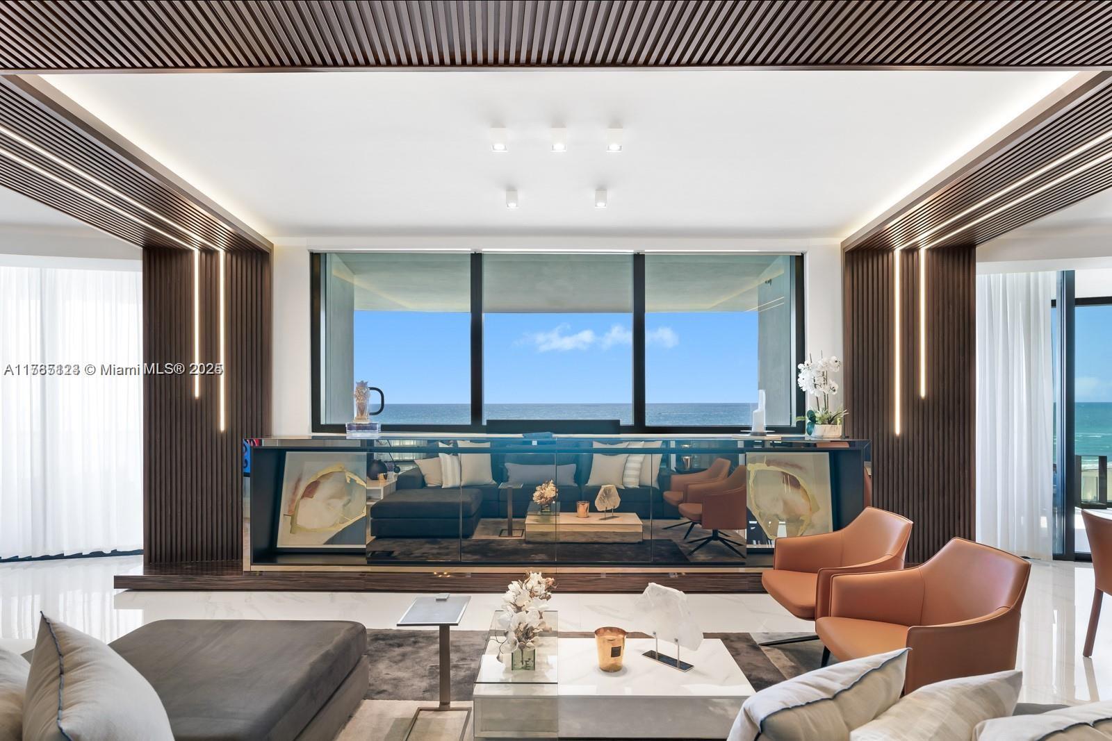 18555 Collins Avenue, Unit 701 Sunny Isles Beach, FL 33160 - Photo 5 of 21 a living room with furniture