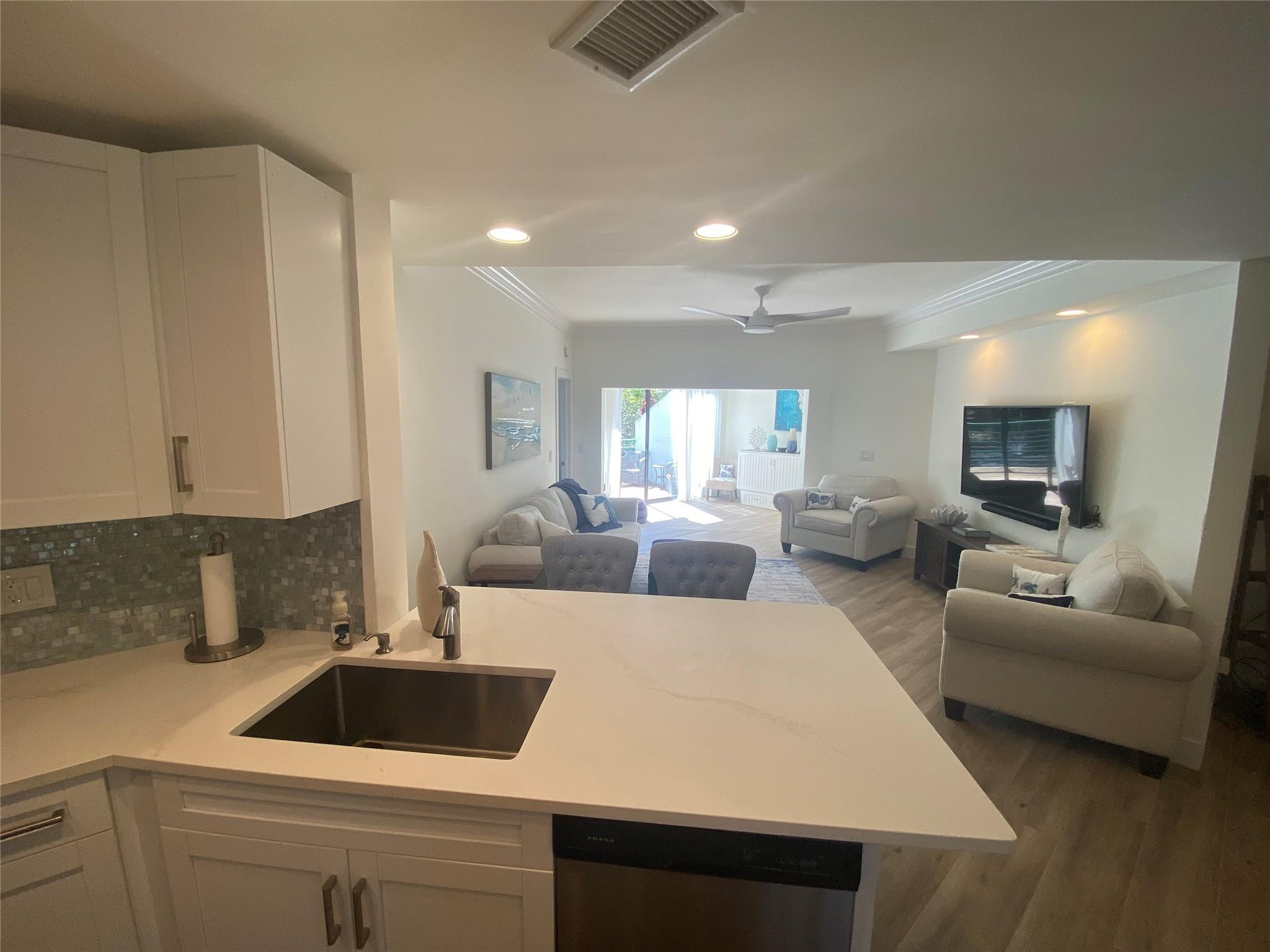 2286 Anchorage Lane, Unit A Naples, FL 34104 - Photo 9 of 41 Overlooking Living Room