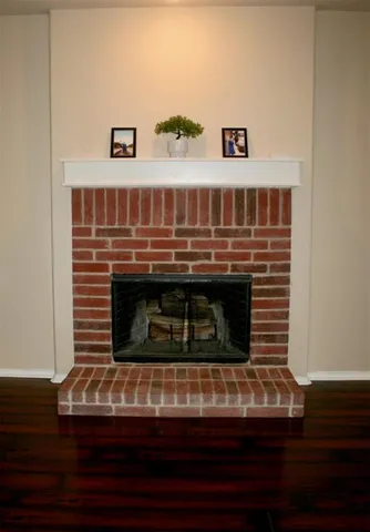 a stove top oven sitting inside of a kitchen
