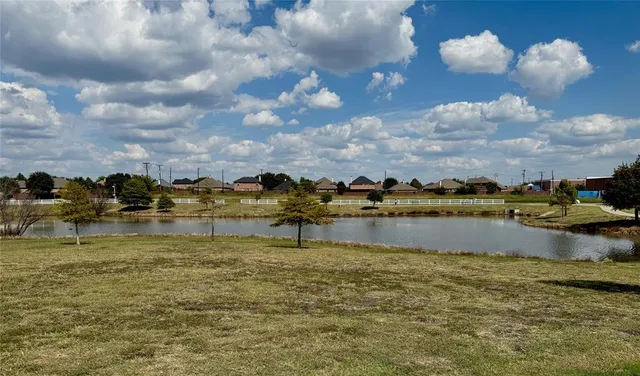 a view of a lake with houses