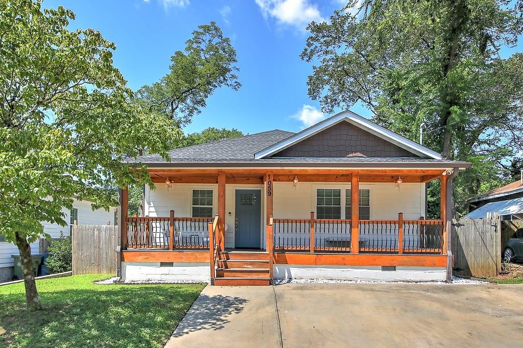 1059 Smith Street Southwest Atlanta, GA 30310 - Photo 1 of 1 a view of a house with backyard porch and sitting area