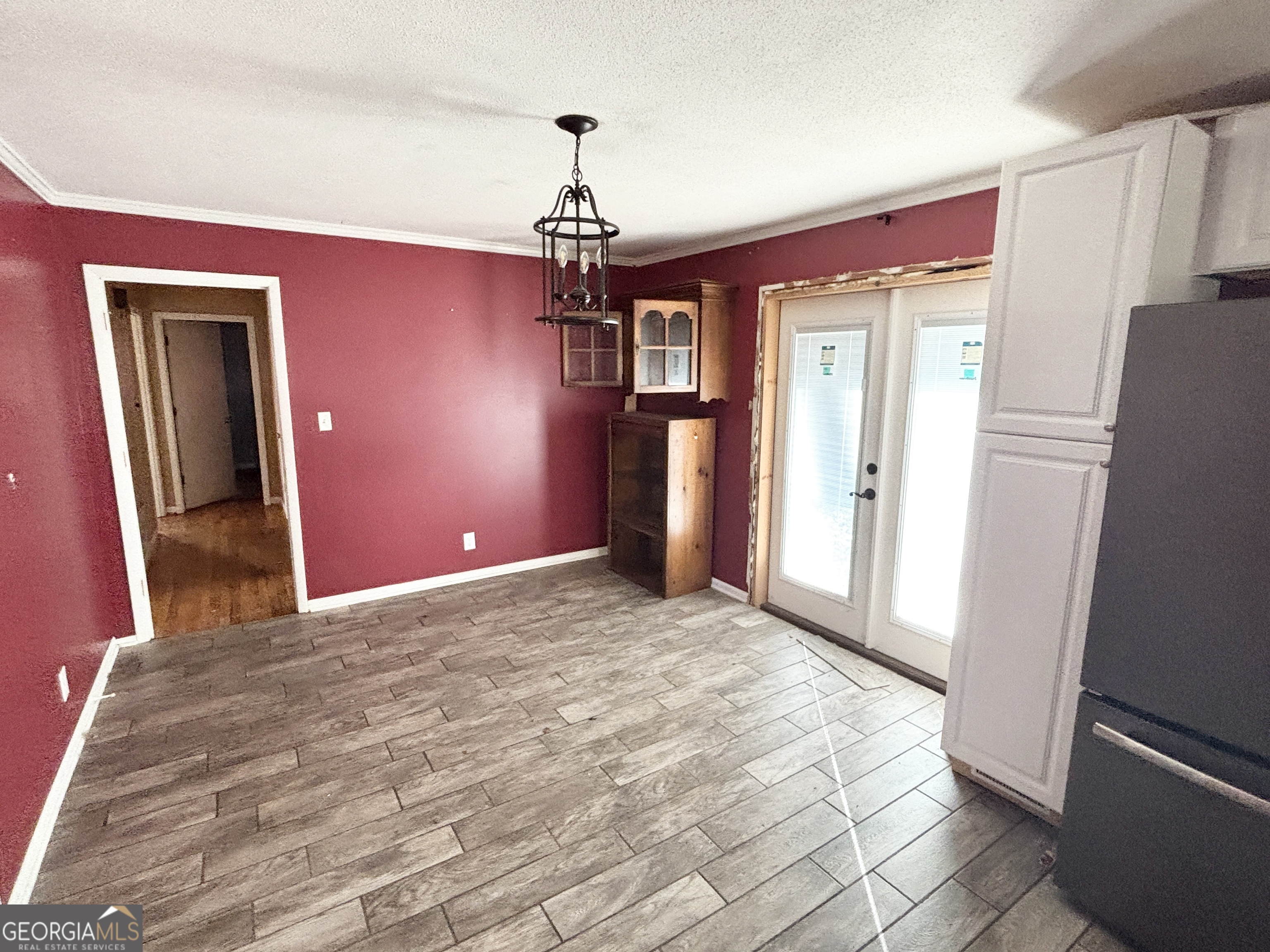210 Arrowhead Road Athens, GA 30606 - Photo 4 of 15 a view of a livingroom with a chandelier