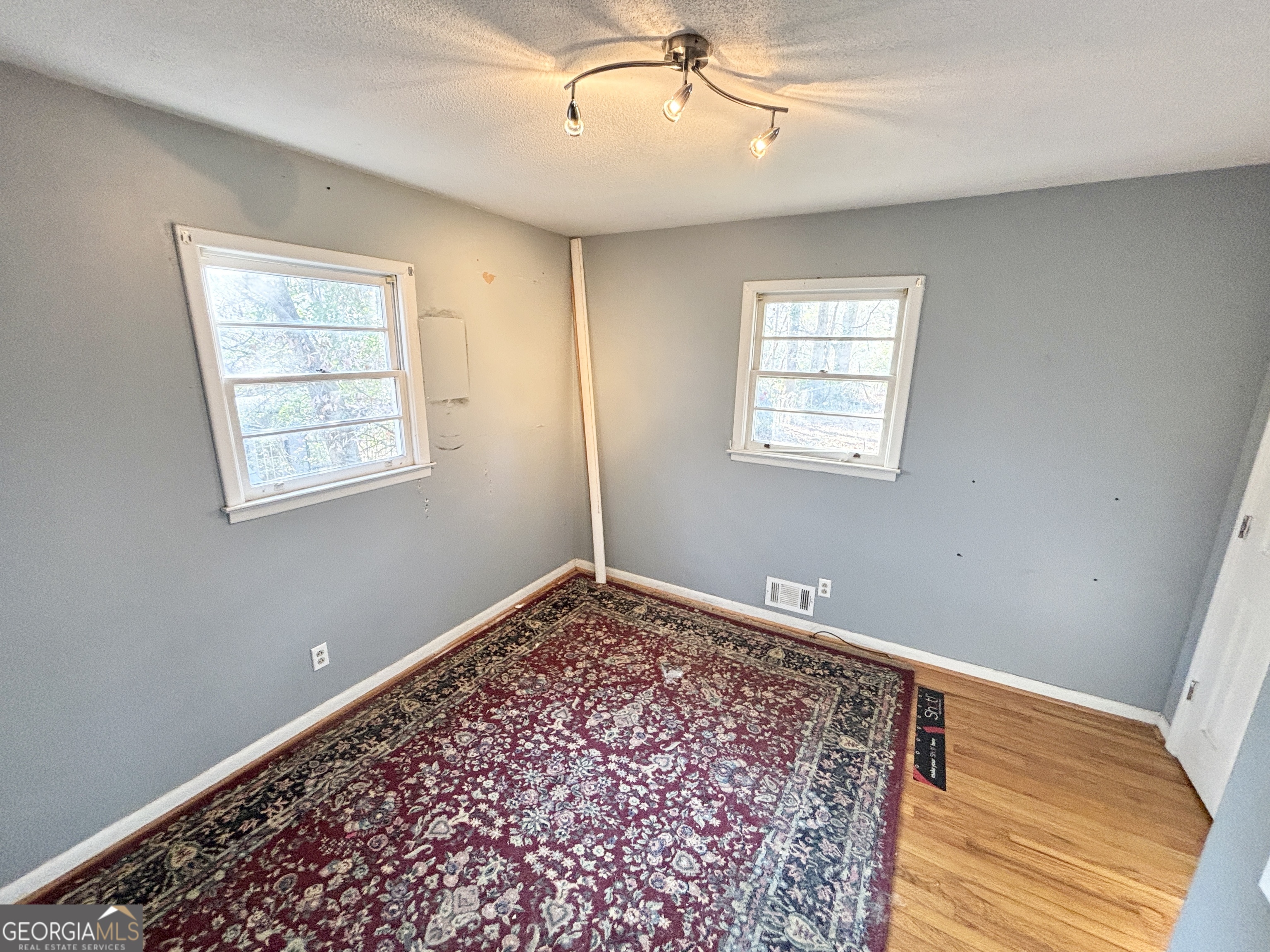 210 Arrowhead Road Athens, GA 30606 - Photo 10 of 15 a view of an empty room with a window