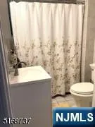 a bathroom with a sink and a toilet