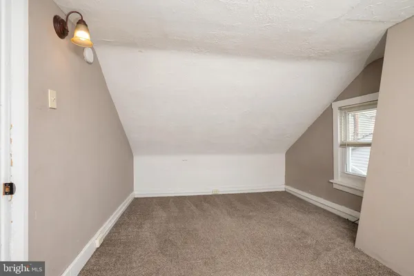 a view of a room that has a window