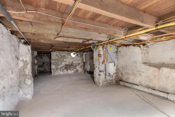 a view of a room with wooden walls