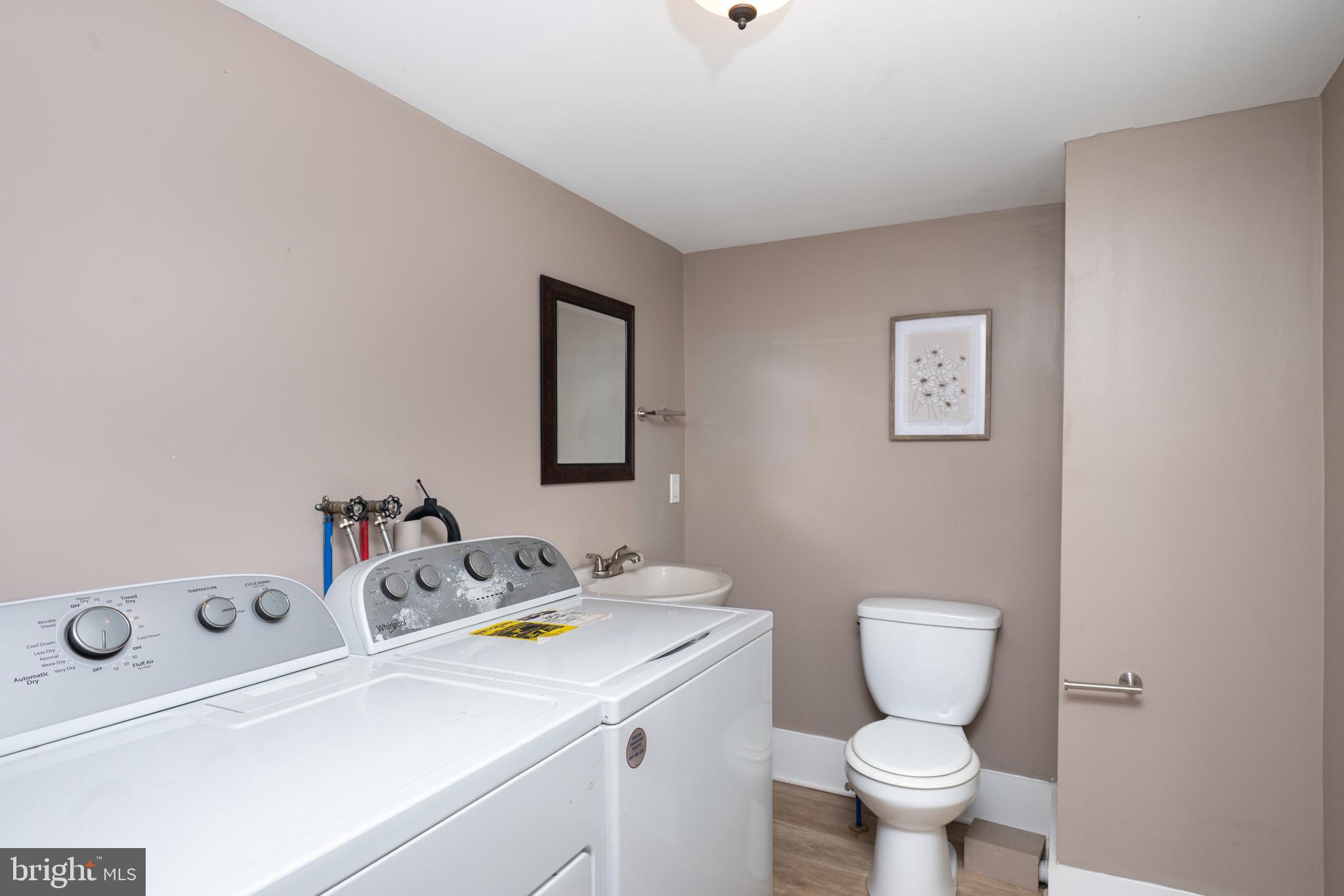 308 Summer St Road Royersford, PA 19468 - Photo 8 of 24 a bathroom with a sink toilet and vanity