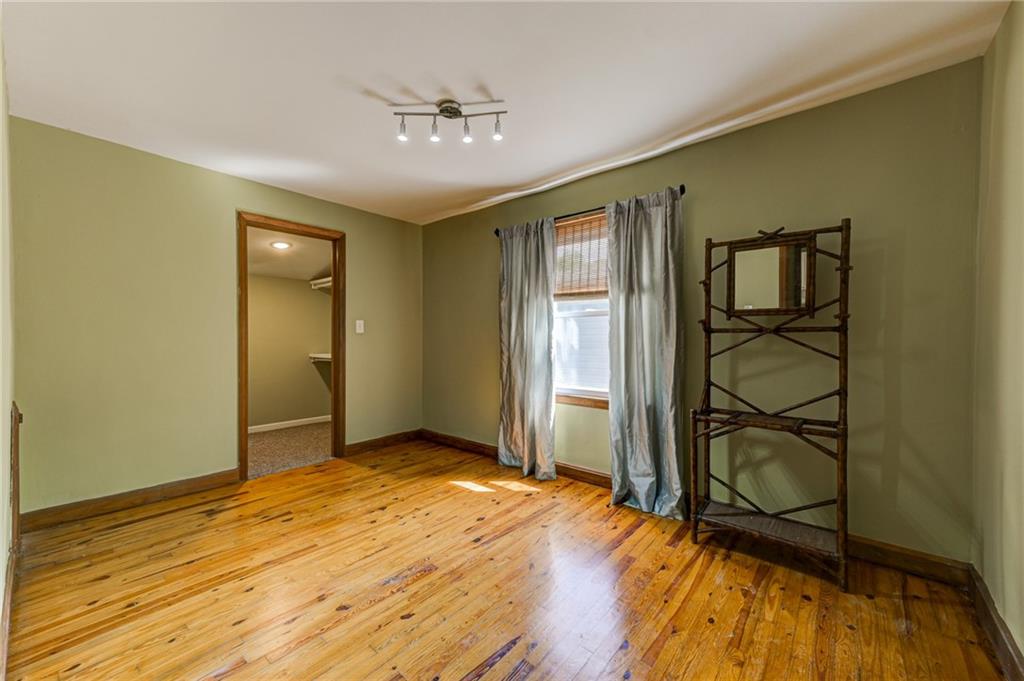 4100 Adrian Street Tucker, GA 30084 - Photo 17 of 23 wooden floor in an empty room