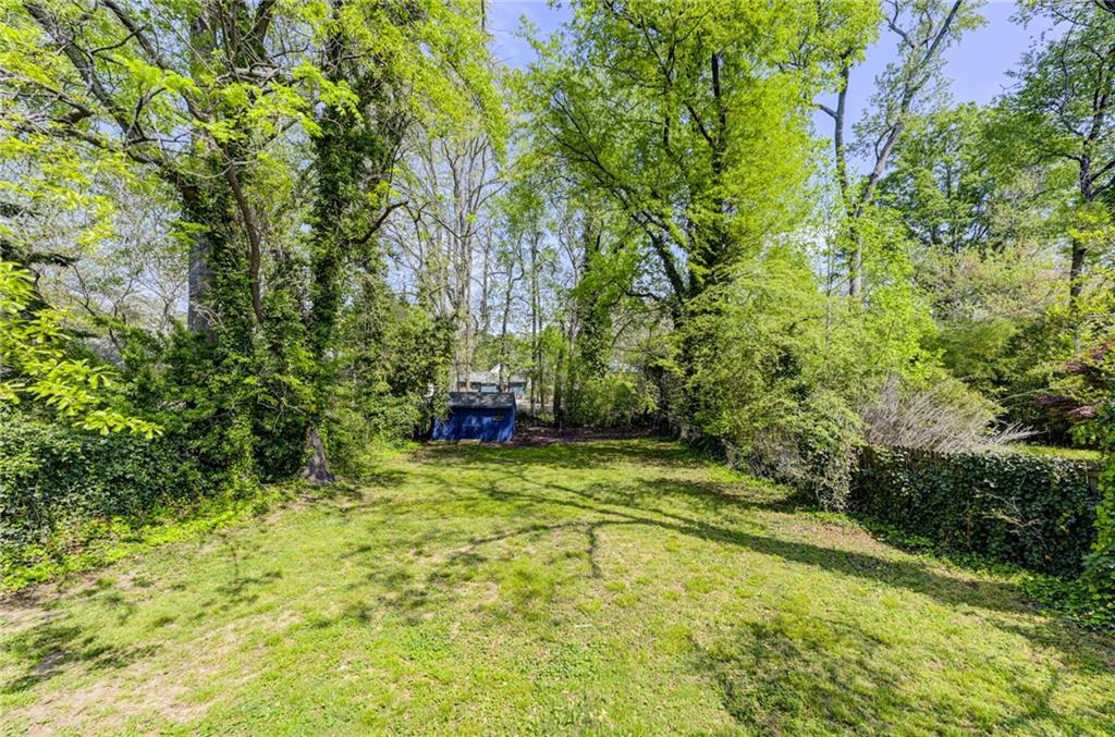 4100 Adrian Street Tucker, GA 30084 - Photo 20 of 23 a view of a yard with basketball court