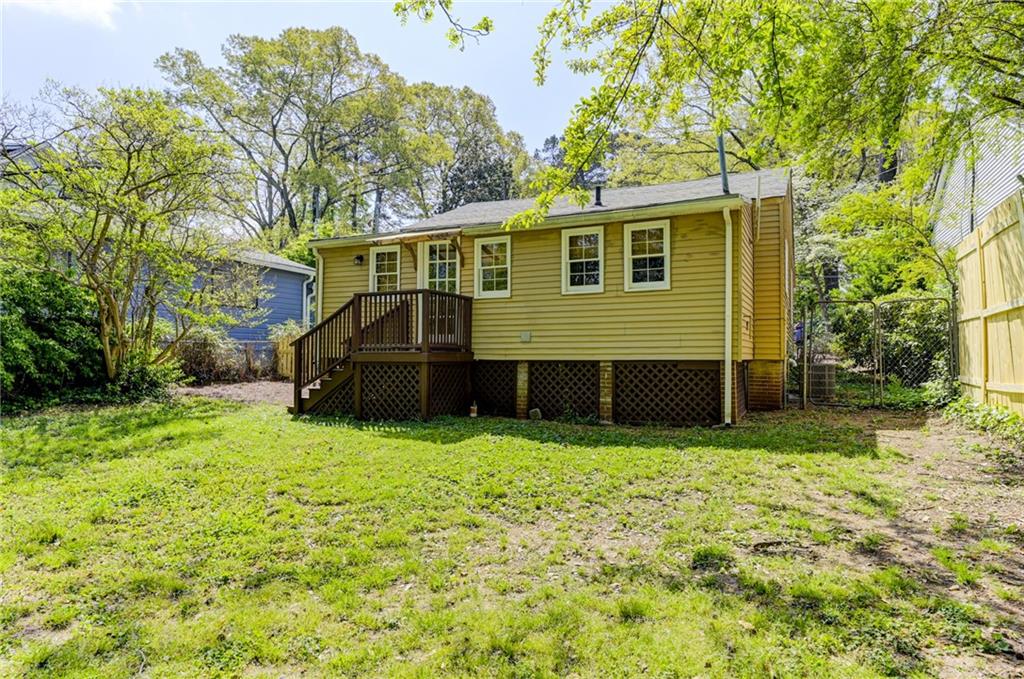 4100 Adrian Street Tucker, GA 30084 - Photo 22 of 23 a front view of a house with a yard