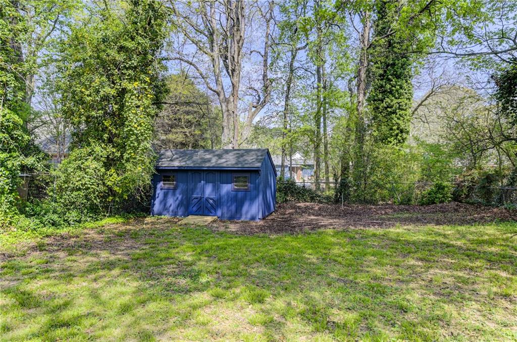 4100 Adrian Street Tucker, GA 30084 - Photo 23 of 23 a view of yard with trees