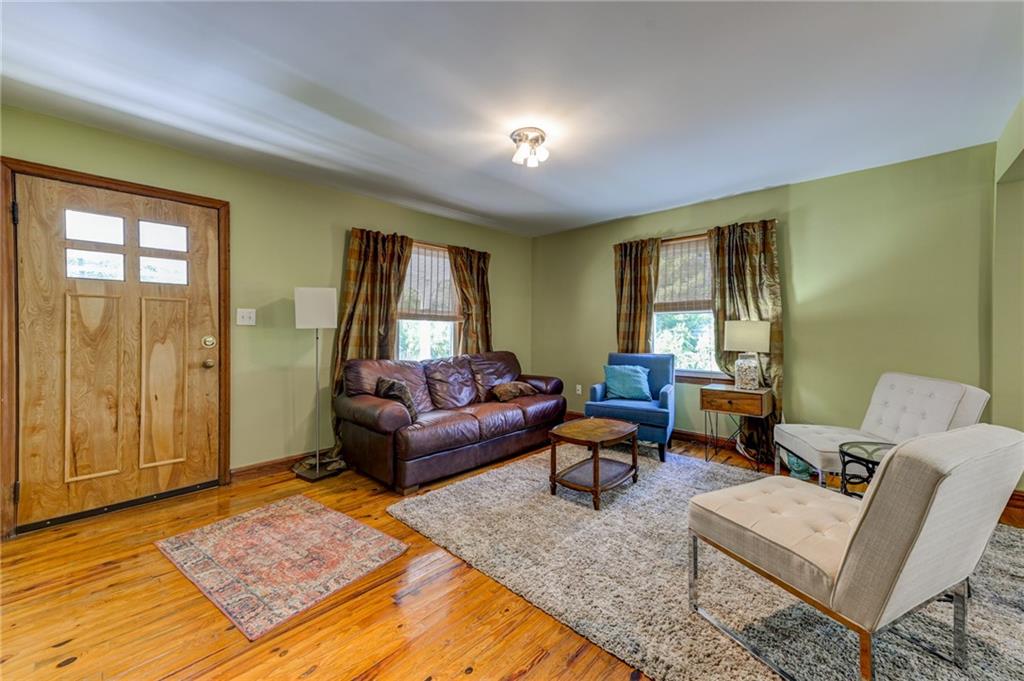 4100 Adrian Street Tucker, GA 30084 - Photo 4 of 23 a living room with furniture and a rug