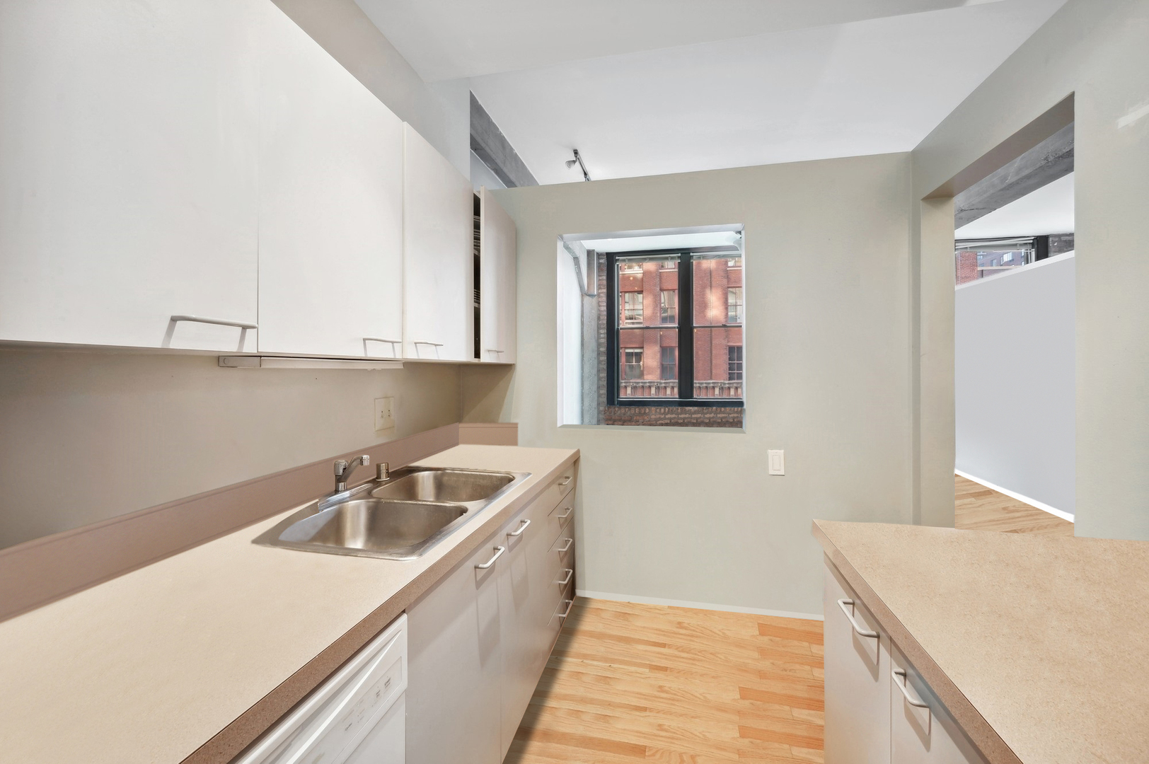 720 South Dearborn Street, Unit 305 Chicago, IL 60605 - Photo 18 of 20 a kitchen that has a sink and a stove