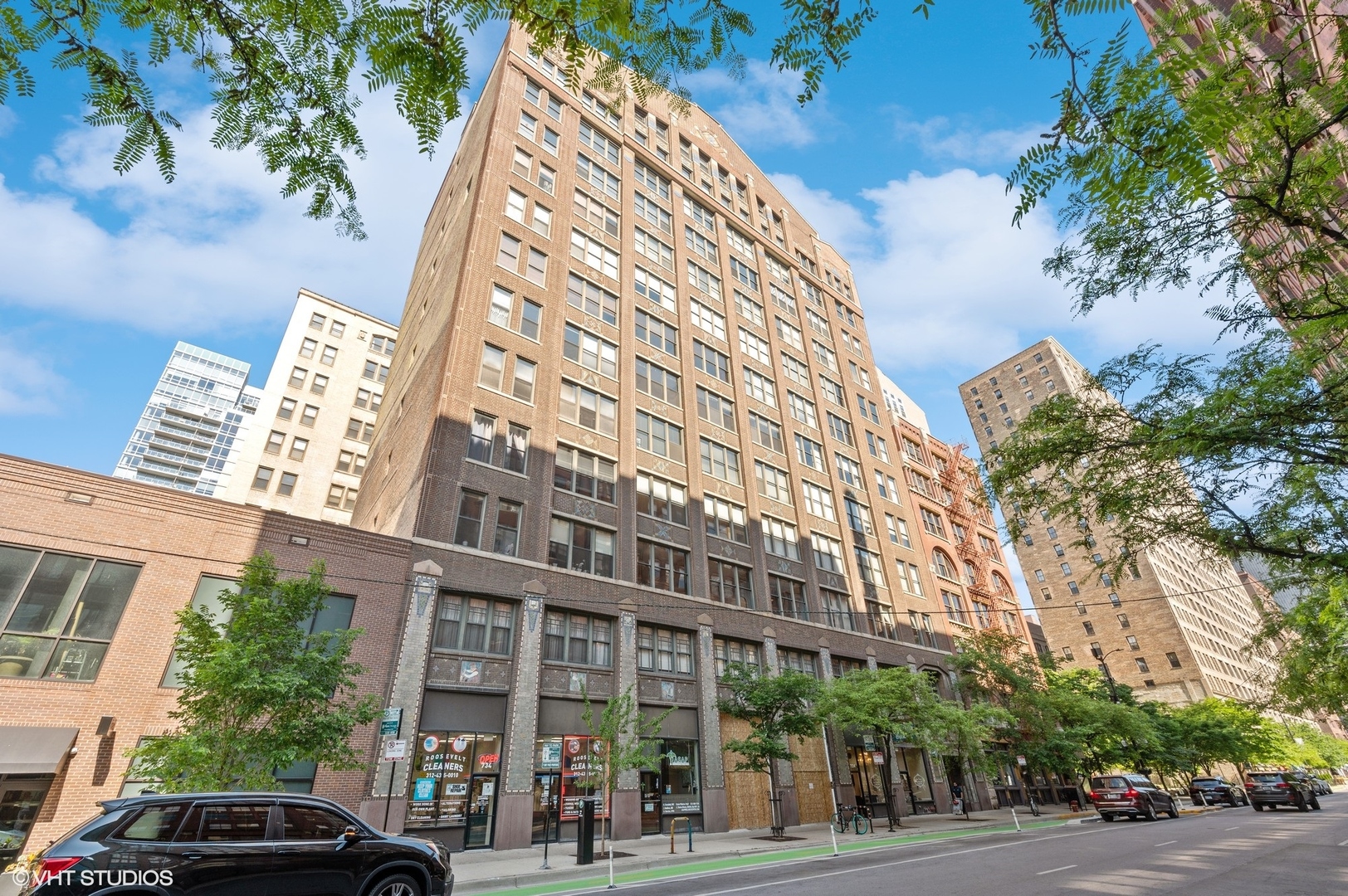 720 South Dearborn Street, Unit 305 Chicago, IL 60605 - Photo 2 of 20 a view of a tall building next to a road