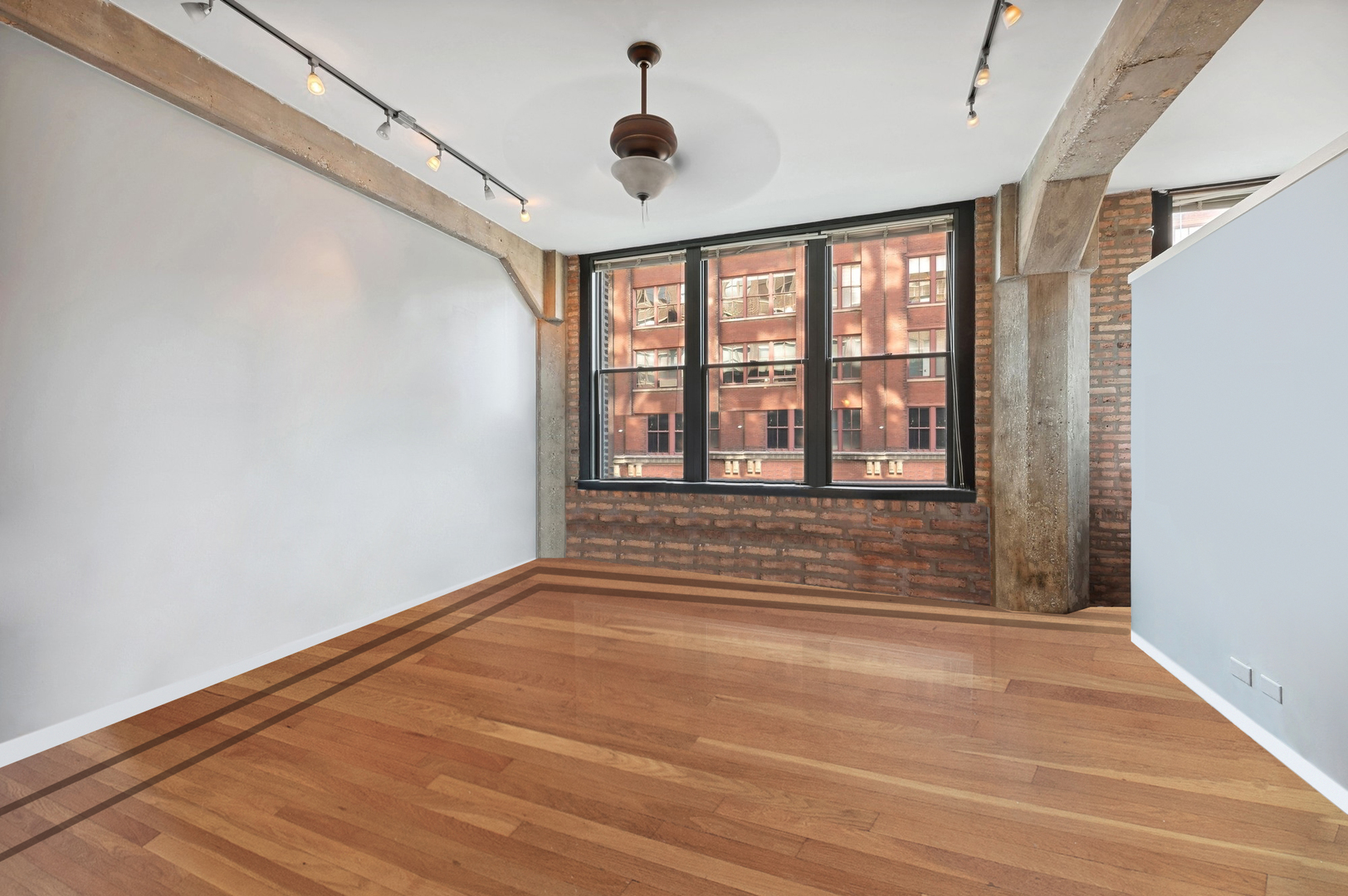 720 South Dearborn Street, Unit 305 Chicago, IL 60605 - Photo 5 of 20 a view of an empty room with a window