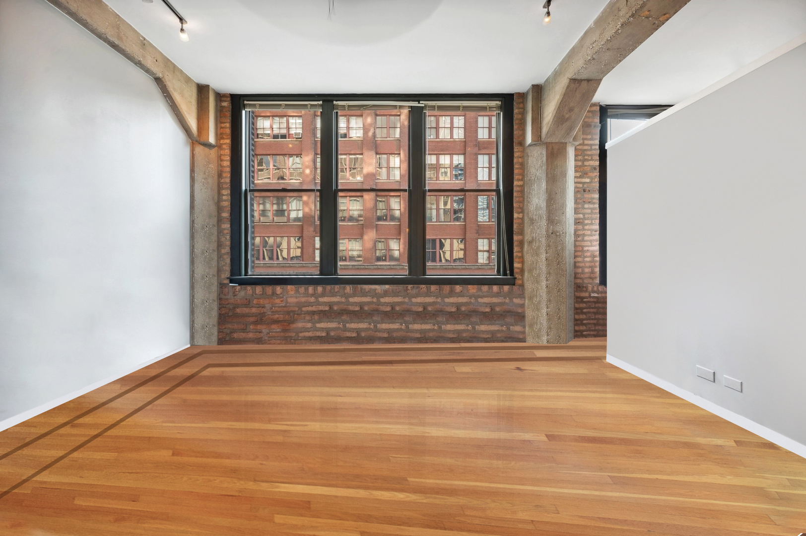 720 South Dearborn Street, Unit 305 Chicago, IL 60605 - Photo 7 of 20 a view of a livingroom with wooden floor