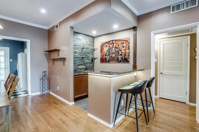 a view of a livingroom with furniture and wooden floor