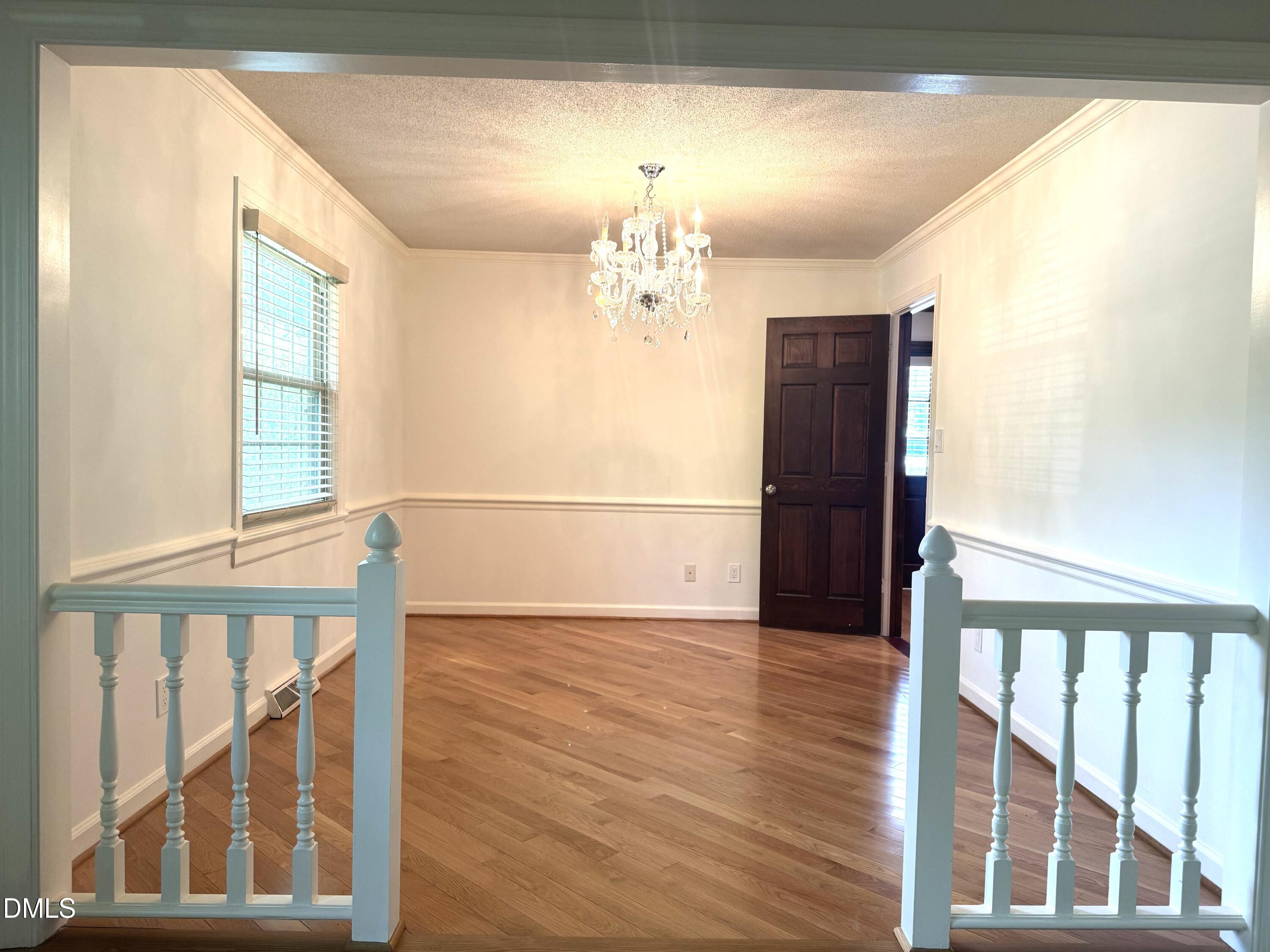 8133 Holly Forest Road Wake Forest, NC 27587 - Photo 21 of 50 a view of entryway with wooden floor