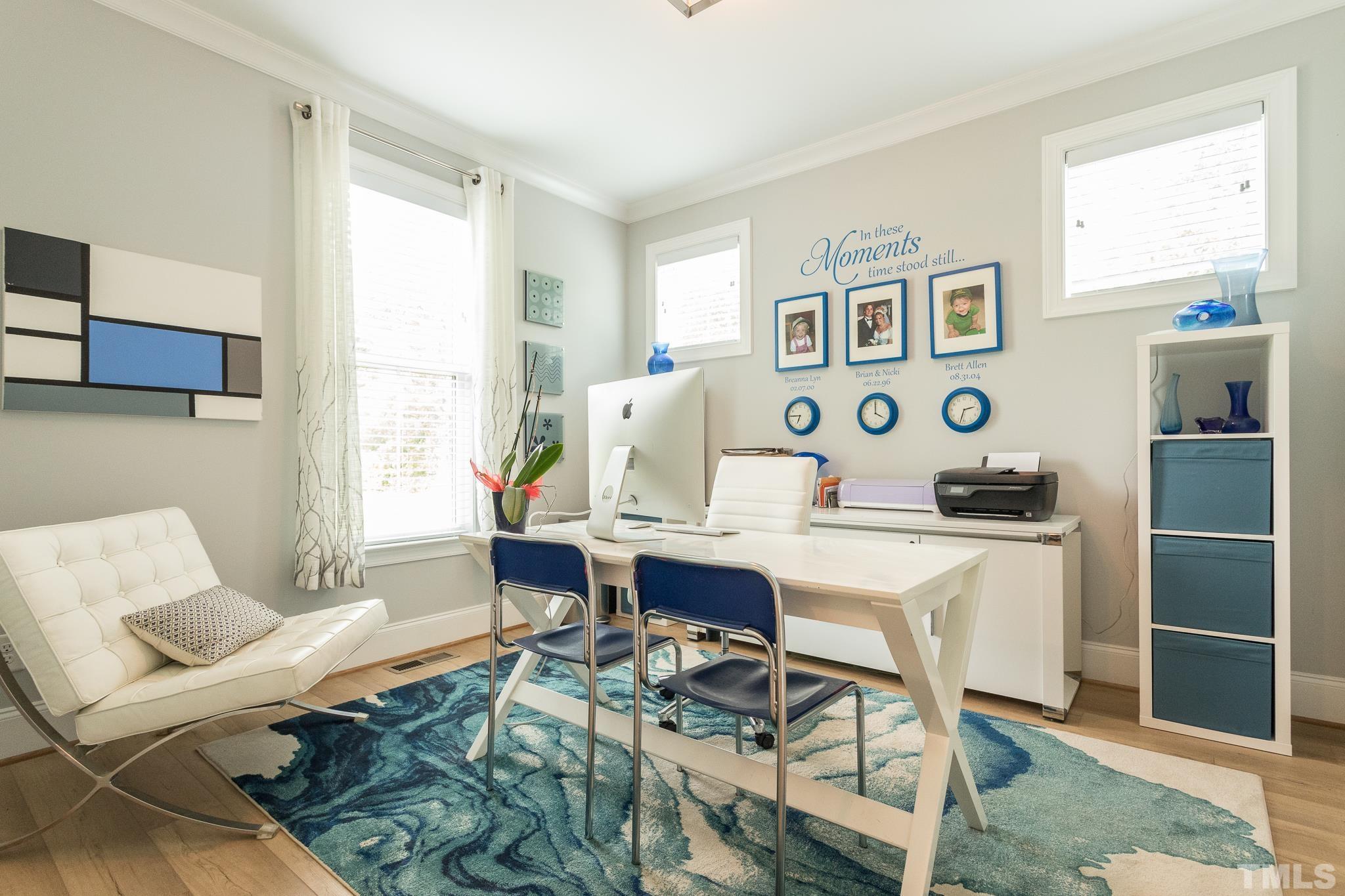 9117 Penny Road Raleigh, NC 27606 - Photo 14 of 54 a workspace with furniture and window