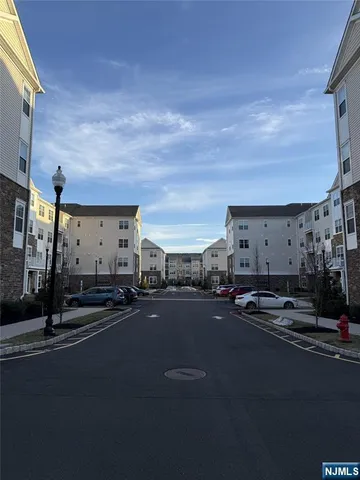 an empty room with windows and mountain view