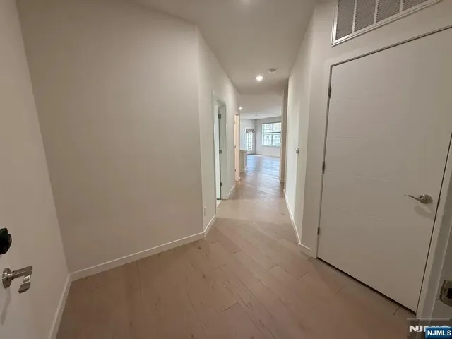 a bathroom with a double vanity sink and mirror