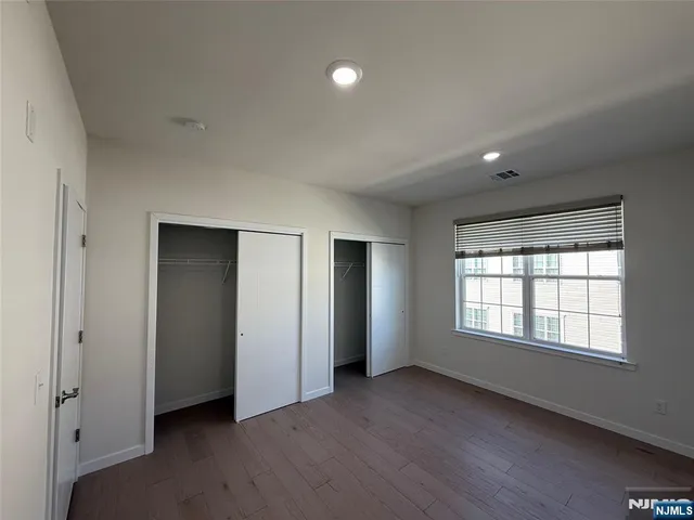 a bathroom with a sink mirror toilet and bathtub