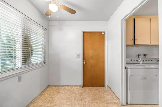 a view of a kitchen with a sink