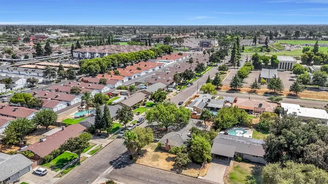 an aerial view of a city with lots of residential buildings