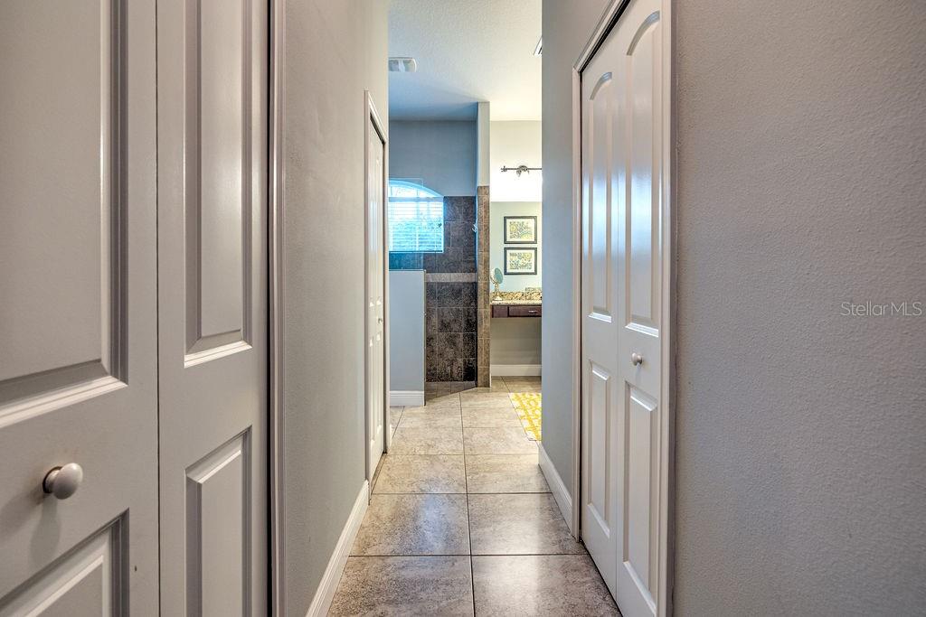 316 Old Mill Road Deltona, FL 32725 - Photo 20 of 64 a view of a livingroom from a hallway