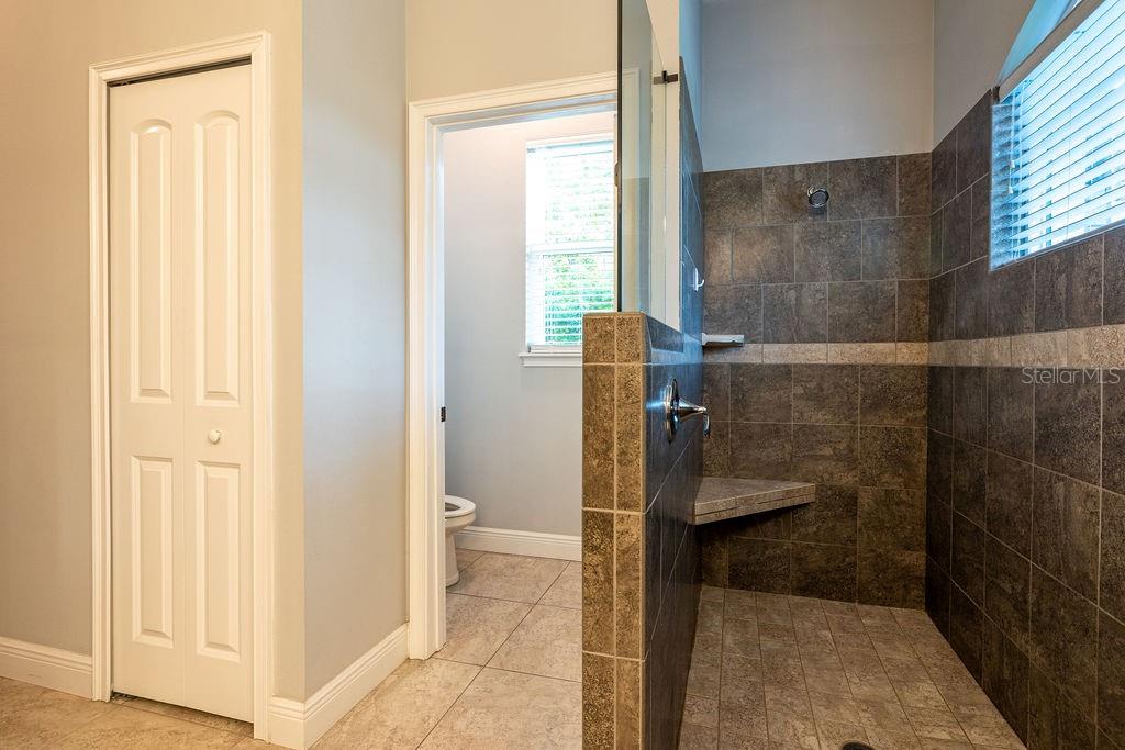 316 Old Mill Road Deltona, FL 32725 - Photo 23 of 64 a bathroom with a shower
