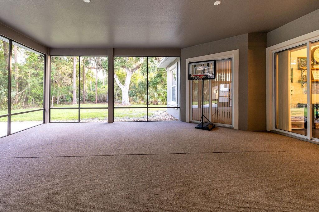 316 Old Mill Road Deltona, FL 32725 - Photo 30 of 64 a view of empty room with floor to ceiling windows