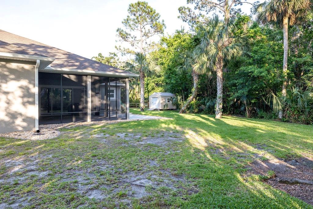 316 Old Mill Road Deltona, FL 32725 - Photo 55 of 64 a view of a house with backyard and porch