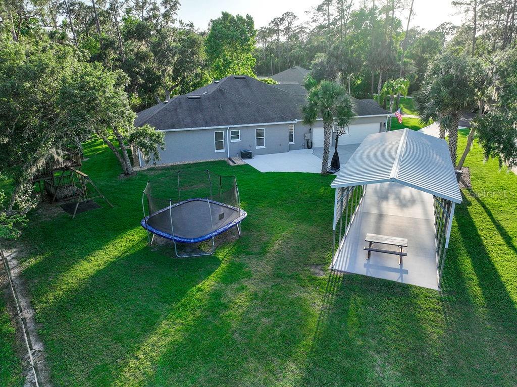 316 Old Mill Road Deltona, FL 32725 - Photo 61 of 64 a view of outdoor space yard and patio