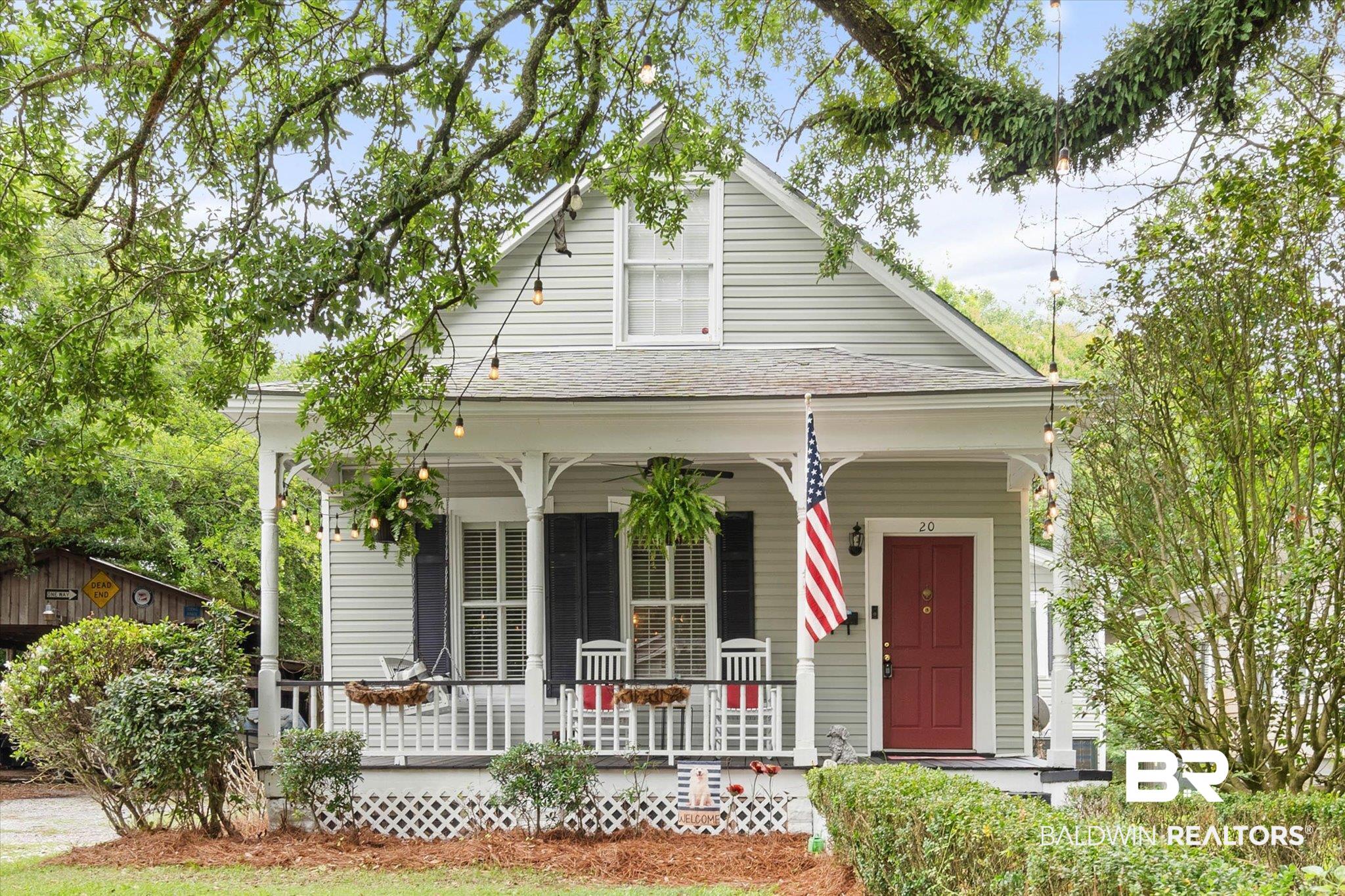 20 Hurlbert Street Mobile, AL 36607 - Photo 1 of 33 View of front of house with covered porch and a shingled roof
