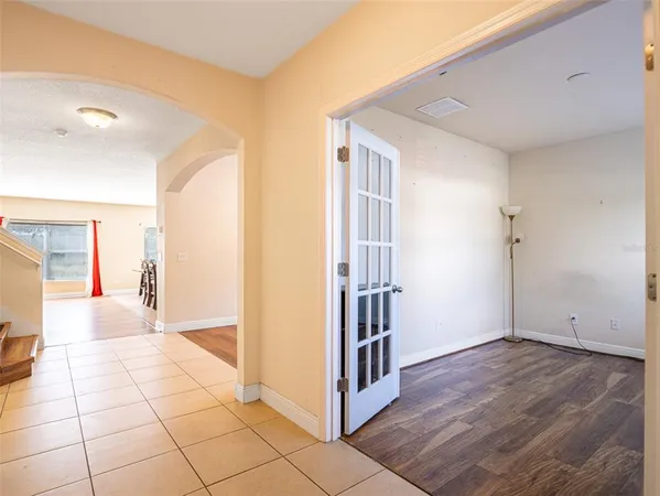 a view of entryway with stairs and a window