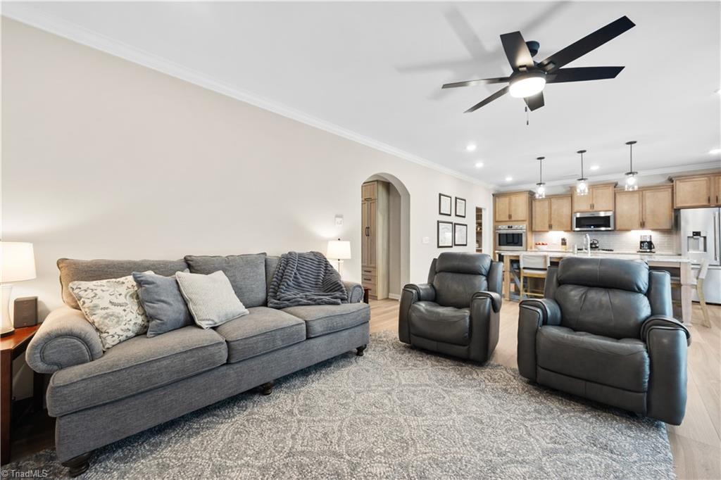 180 Moravian Advance, NC 27006 - Photo 11 of 34 Family room opens to the kitchen and sunroom.