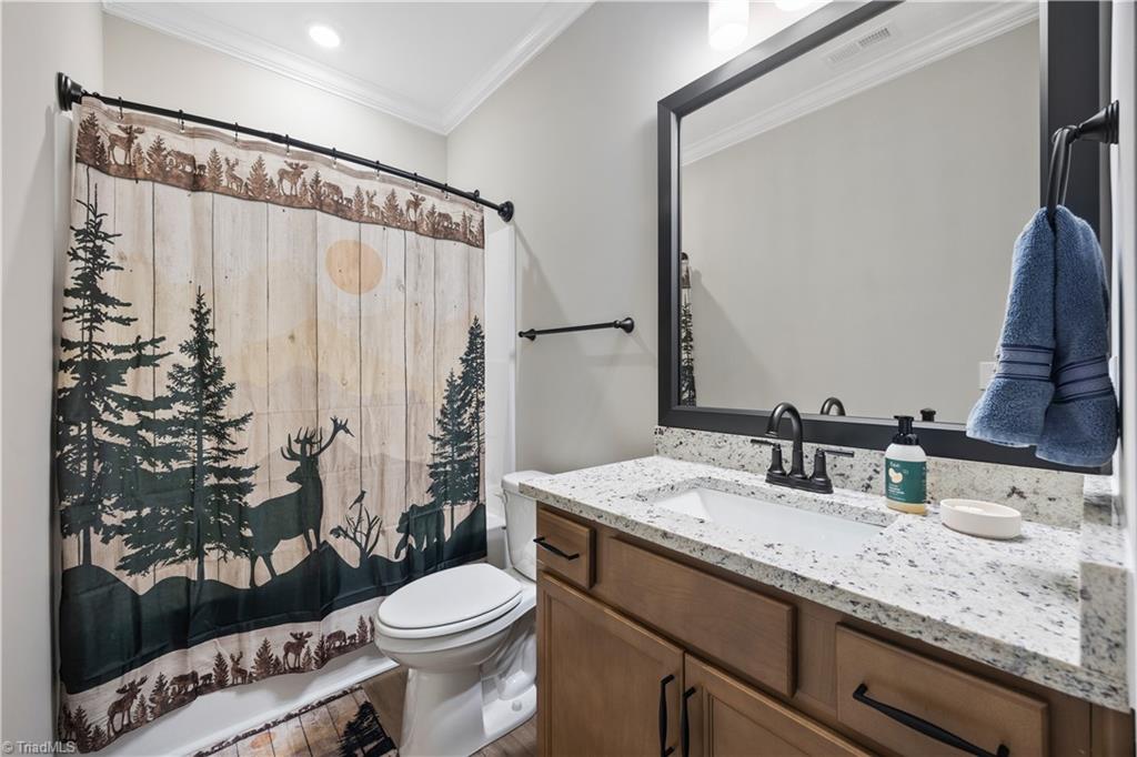 180 Moravian Advance, NC 27006 - Photo 17 of 34 Full guest bath on the main.