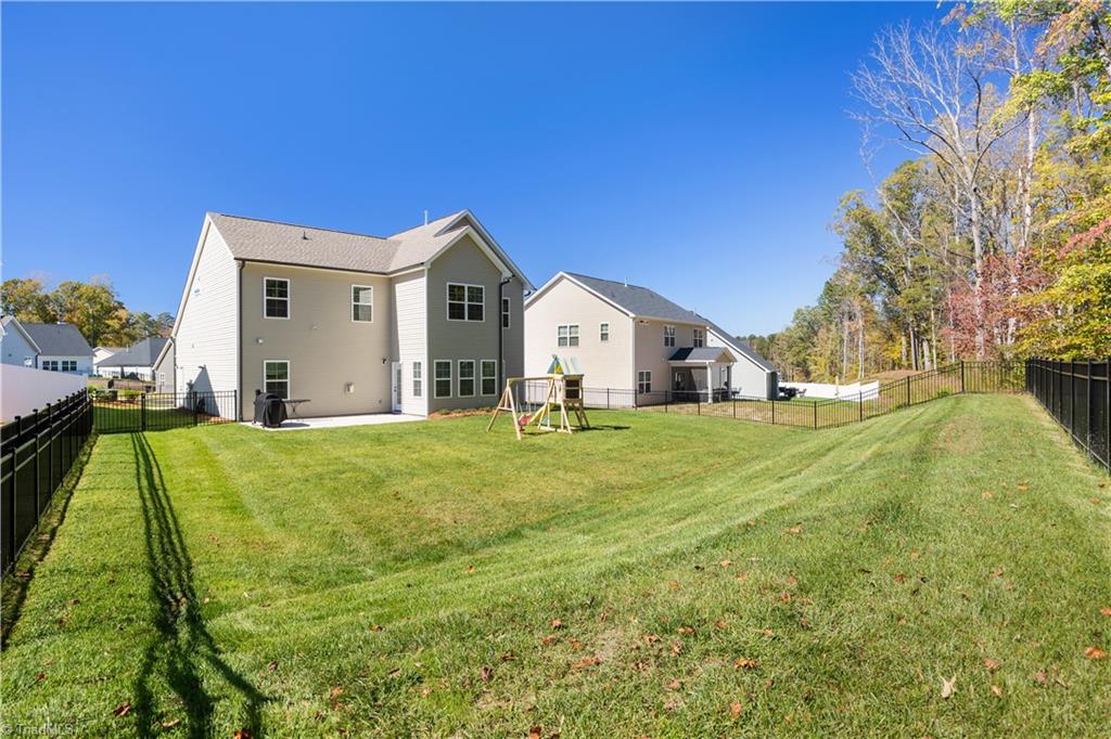 180 Moravian Advance, NC 27006 - Photo 29 of 34 Huge backyard with full irrigation.